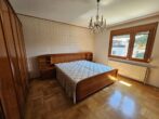 Bild - Unterkellerter Bungalow in ruhiger Siedlungslage mit 1.200m² Grundstücksfläche!